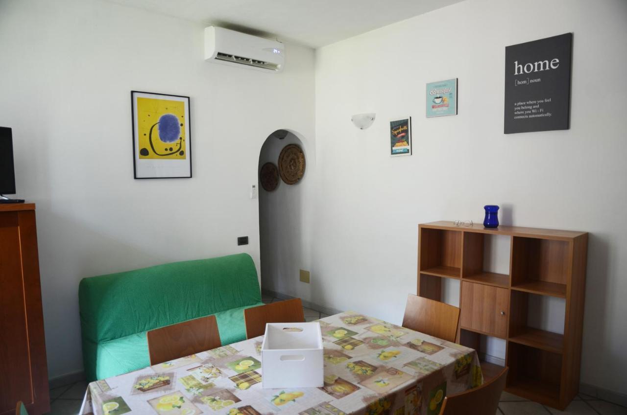 Апартаменты Calipso House - Posto Auto Gratuito Порто Санто Стефано Экстерьер фото